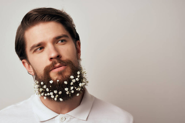 handsome man hairstyle fashion flowers emotions Studio Lifestyle - Foto, Bild