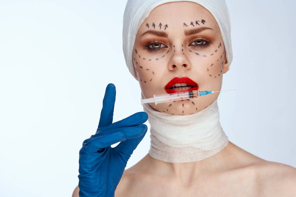 female patient Red lips plastic surgery operation bare shoulders isolated background - Valokuva, kuva