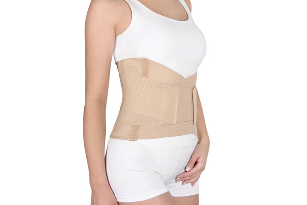 Orthopedic lumbar support corset products. Lumbar Support Belts. Posture Corrector For Back Clavicle Spine. Lumbar Waist Support Belt Strong Lower Back Brace Support - Φωτογραφία, εικόνα
