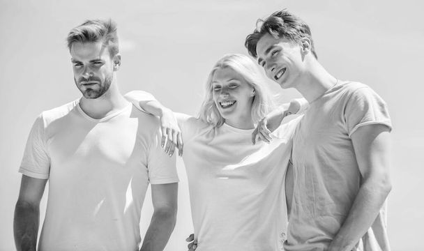 Friend zone concept. Happy together. Cheerful friends. Friendship relations. People outdoors. Happy woman and two men. Member friendship wishes to enter into romantic relationship. Friendship love - Фото, зображення
