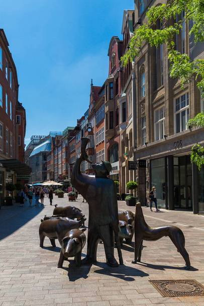 Exterior of the statue of the Swineherd with a dog and pigs in Bremen, Germany Jily 15, 2021 - 写真・画像