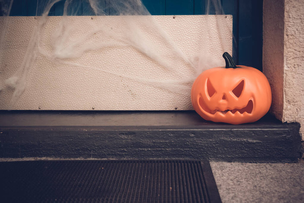 A pumpkin for a Halloween decoration - Фото, изображение