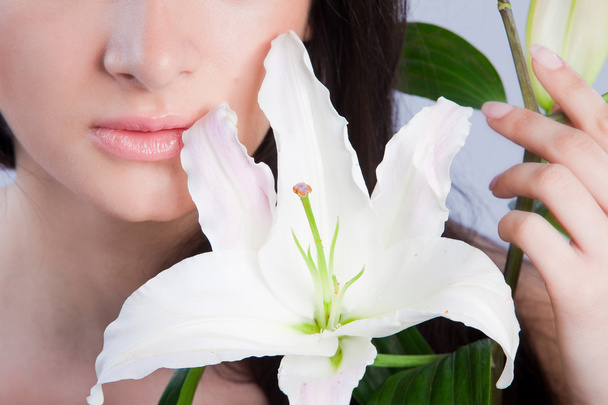 Beautiful woman with lily - Foto, immagini
