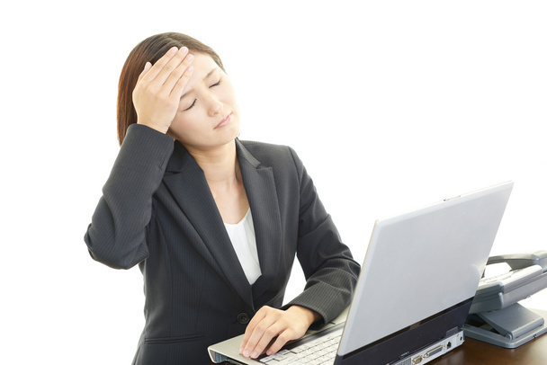 Business nainen päänsärky
 - Valokuva, kuva