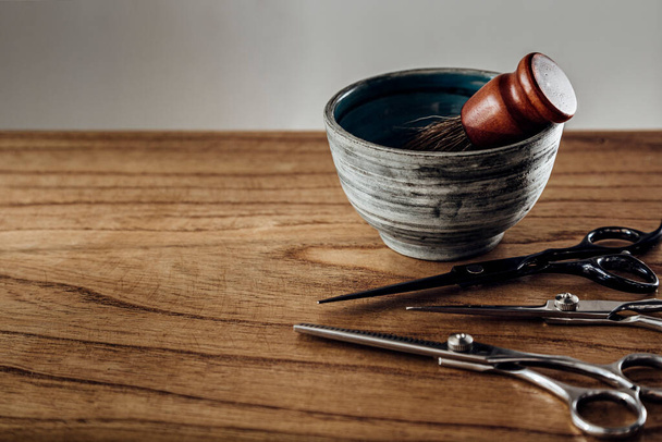 Tools of barber shop over a wooden table. Copy space. - Foto, afbeelding