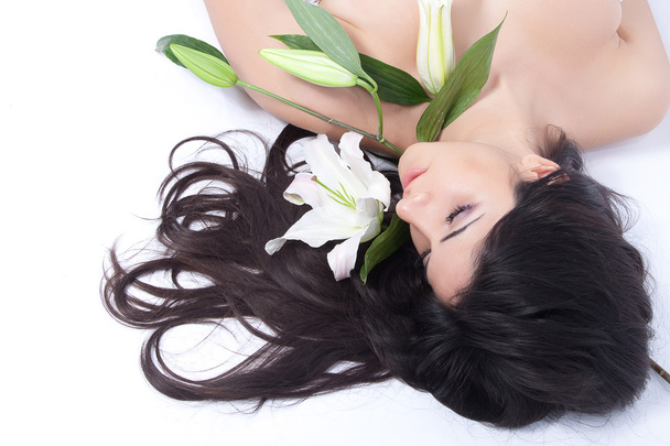 Beautiful woman with lily - Fotografie, Obrázek