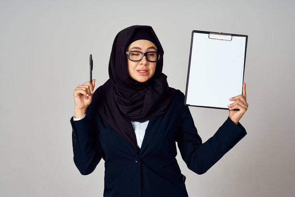 woman in black hijab laptop work technology office - Фото, изображение