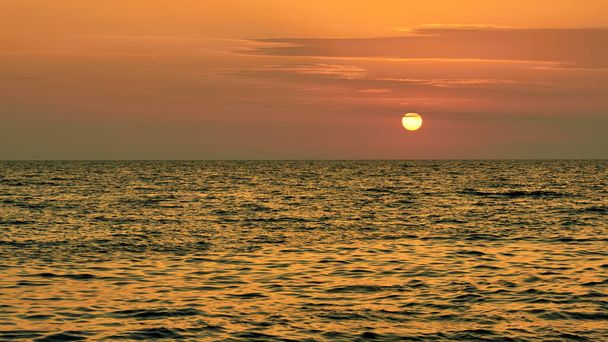 Beautiful summer sunset above the sea. Summer background. - Zdjęcie, obraz