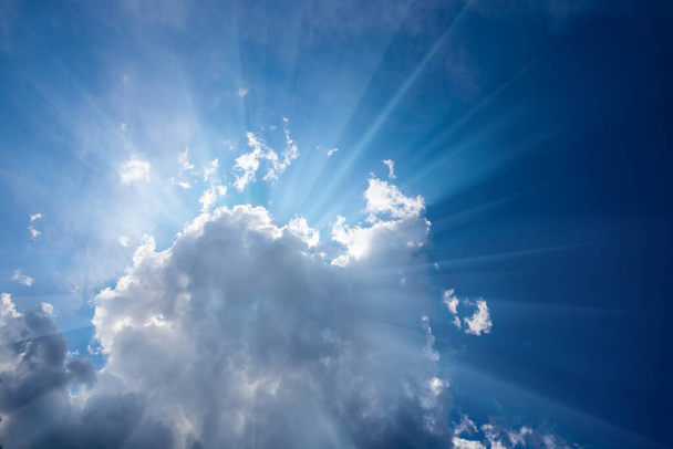 closeup cumulus clouds in light of sun, natural summer sky background - Фото, изображение