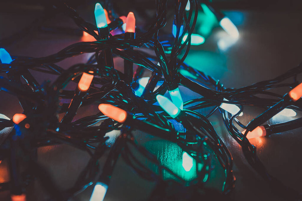 Colorful garland for lighting the room for the holiday. Christmas light - Zdjęcie, obraz
