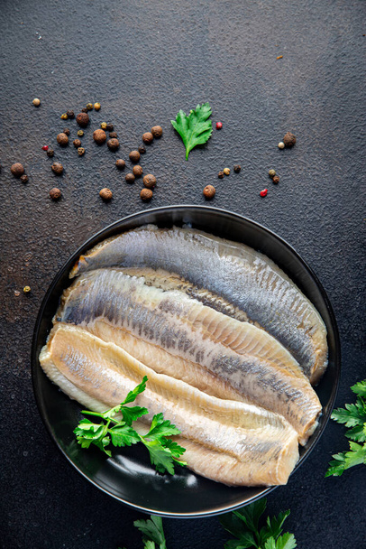 hering hal filé friss tenger gyümölcsei liszt snack az asztalon másolni tér élelmiszer háttér - Fotó, kép