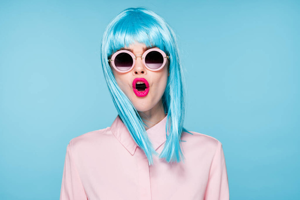 beautiful woman in blue wig sunglasses Glamor fashion - Foto, Imagen