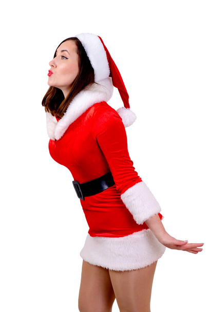 Donna con sorriso in costume da Babbo Natale su sfondo bianco  - Foto, immagini