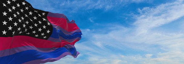 flag of BiAmerica waving in the wind at cloudy sky. Freedom and love concept. Pride month. activism, community and freedom Concept. Copy space. 3d illustration - 写真・画像