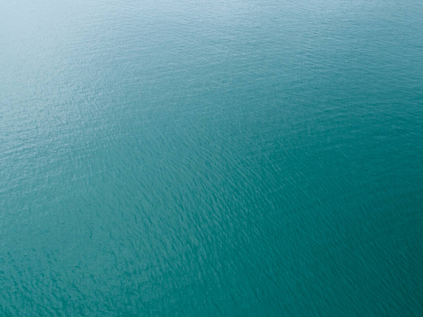Sea surface aerial view,Bird eye view photo of small waves and water surface texture Turquoise sea background Beautiful nature Amazing view - Zdjęcie, obraz