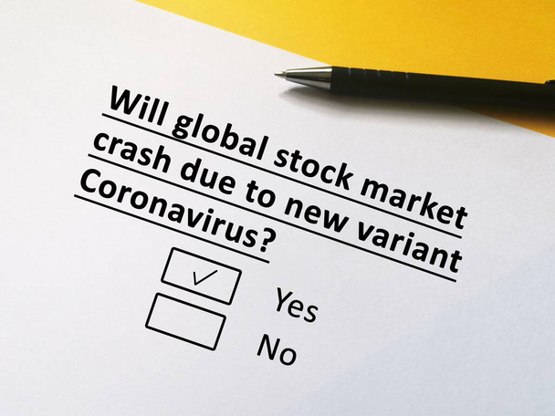 Une personne répond à la question sur la nouvelle variante du coronavirus. La personne pense que le marché boursier mondial va éruption due à une nouvelle variante coronavirus. - Photo, image