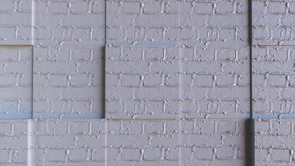 Mur de briques avec niches
 - Séquence, vidéo