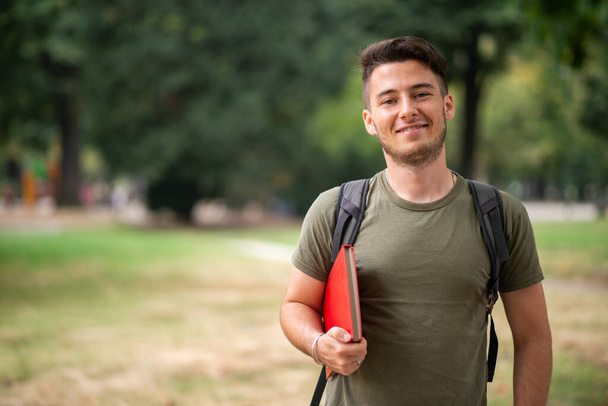 Male student at the park - Foto, afbeelding