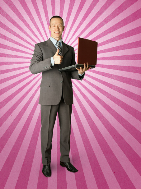 Full length portrait of businessman with laptop - Photo, Image