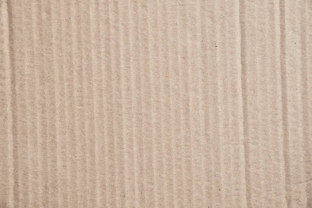 Rustic brown paperboard. Rough cardboard kraft texture - Photo, Image