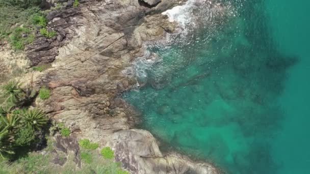 Aerial view of seashore rocks in Phuket ocean Sea waves crashing  on rocks cliff seascape Aerial view drone 4k High quality footage from drone camera Phuket island is destination tourist to travel - Footage, Video