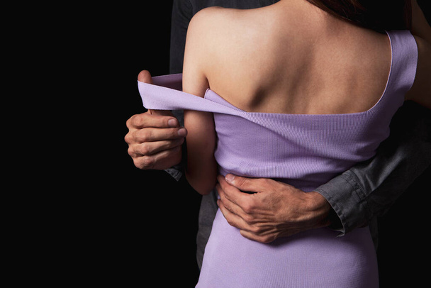 a man sexually takes off a woman's clothes - Valokuva, kuva