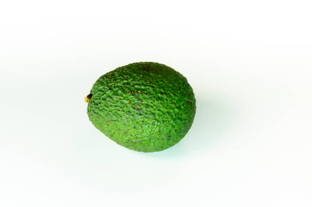 Fresh whole, half and sliced avocado isolated on white background, top view  - Zdjęcie, obraz