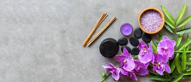 Thai Spa Treatments aroma therapy salt and sugar scrub massage with purple orchid flower on backboard with candle. Thailand. Healthy Concept. copy space for banner, top view - Foto, Imagem