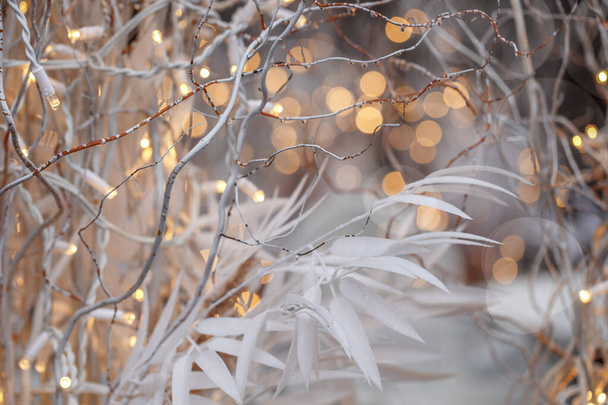 Winter holiday, illumination and decoration concept - bokeh of Christmas garland lights - Fotografie, Obrázek