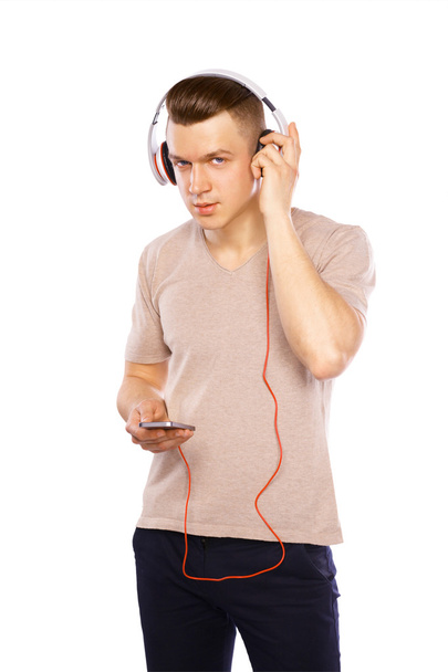 Young man wearing headphones - Foto, imagen