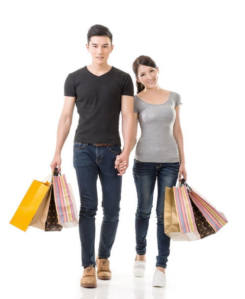 Asian couple shopping - Foto, afbeelding