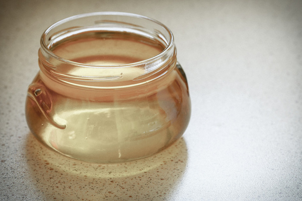 Jar of organic floral honey - Φωτογραφία, εικόνα