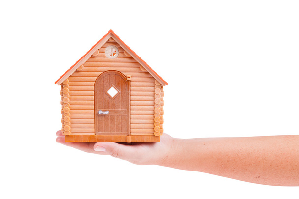 Hausmodell in der Hand isoliert auf weißem Hintergrund - Foto, Bild
