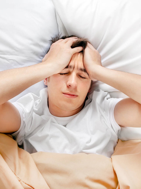 Man feel a Headache in the Bed at the Home - Fotoğraf, Görsel