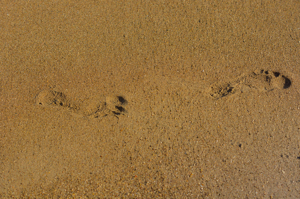 drei menschliche Fußabdrücke - Foto, Bild