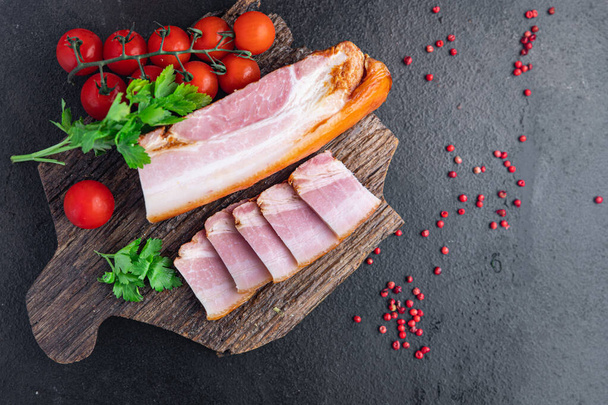 fresh bacon pork piece fat with meat meal snack on the table copy space food background rustic - Photo, Image