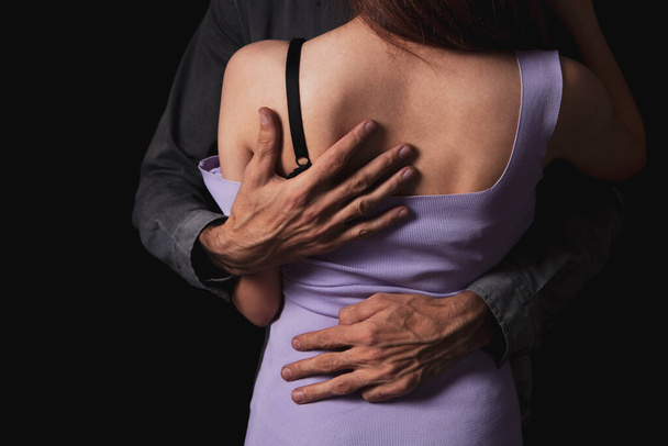 a man sexually takes off a woman's clothes - Fotoğraf, Görsel
