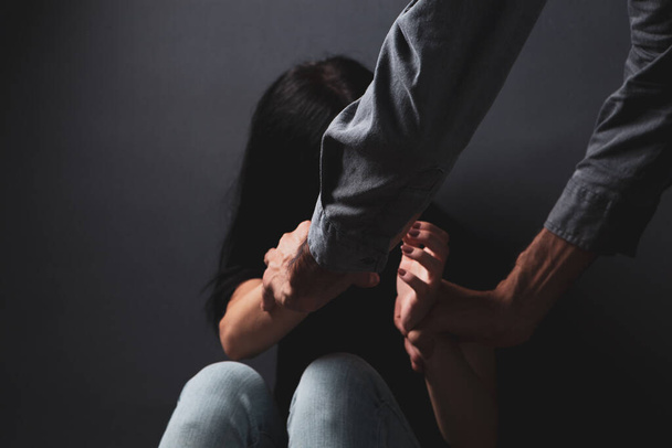 the husband wants to hit his wife. domestic violence - Valokuva, kuva