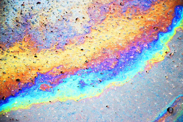 Oil spill on asphalt road background or texture. - Foto, imagen