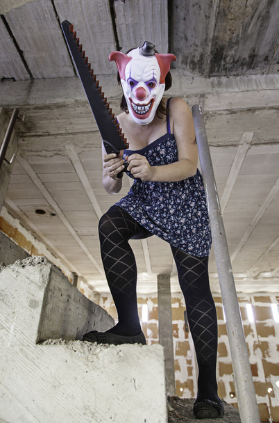 божевільний клоун пила
 - Фото, зображення