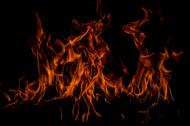 Fire flame burning and fire glowing on black background. - Valokuva, kuva