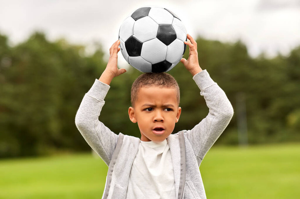 little boy with soccer ball at park - Φωτογραφία, εικόνα