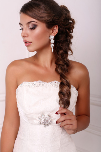 portrait of beautiful elegant bride with dark hair - Fotó, kép