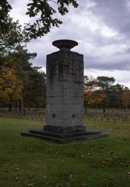 LOMMEL, BELGIUM - Nov 27, 2021: The largest German War Cemetery (Kriegsgraberstatte) and memorial site in Western Europe. Limburg Province. Autumn cloudy day - 写真・画像