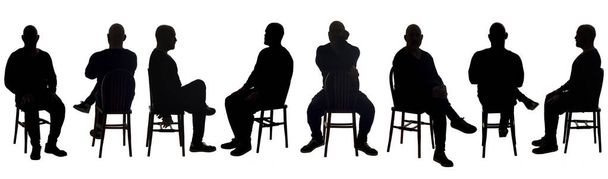 grande gruppo di silhouette dello stesso uomo seduto varie pose - Foto, immagini
