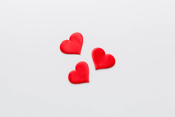 Valentine day background with red hearts, top view with copy space. - Zdjęcie, obraz
