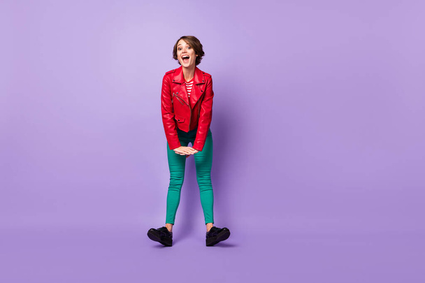 Full body portrait of excited young girl open mouth smile standing on heels isolated on purple color background - Photo, Image