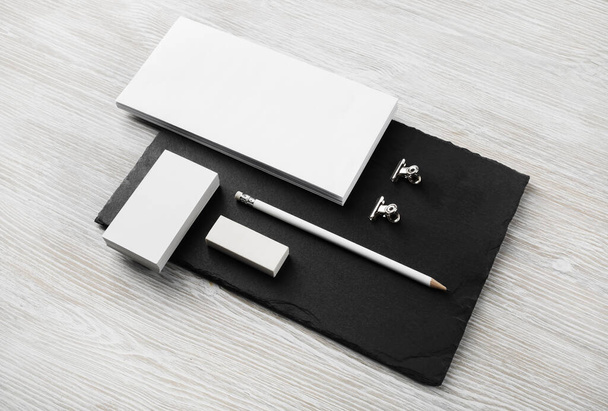 Blank corporate identity template on stone board. Photo of blank stationery set. - Foto, afbeelding