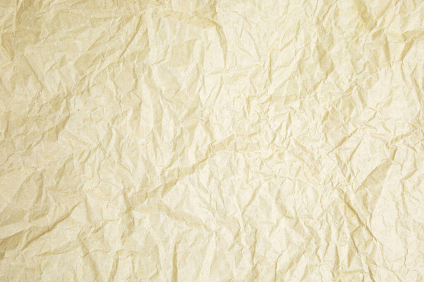 Abstraktní hnědý recyklovaný zmačkaný papír na pozadí. - Fotografie, Obrázek