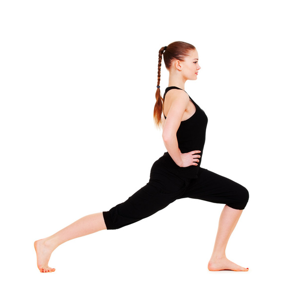 Mujer sonriente haciendo ejercicio de flexibilidad
 - Foto, Imagen
